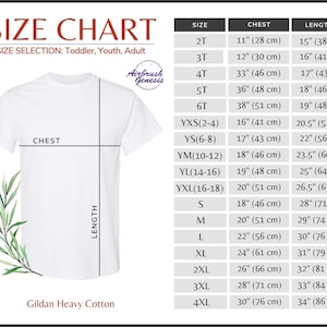 May include: A white t-shirt with a size chart for toddler, youth, and adult sizes. The chart includes chest and length measurements in inches and centimeters. The brand is Gildan Heavy Cotton.