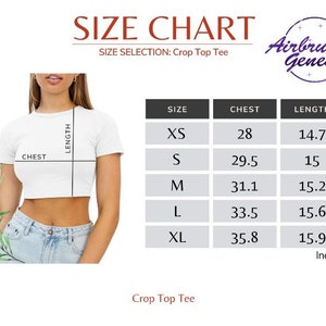 Może przedstawiać: Biały t-shirt crop top z tabelą rozmiar&oacute;w. Tabela zawiera rozmiary od XS do XL, obwody klatki piersiowej od 71,1 do 90,9 cm i długości od 37,3 do 40,4 cm. Widoczne jest logo marki "Airbrush Genesis".