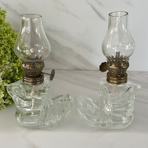 Vintage Miniature Clear Glass Kerosene Boot Lamps with Glass Hurricane. 1960 Hong Kong embossed on bottom.