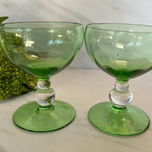 Green Crystal Coupe Style Port or Liqueur Glasses . Beautiful Green Cup and Base. Clear Stem. Set of two. 1970’s