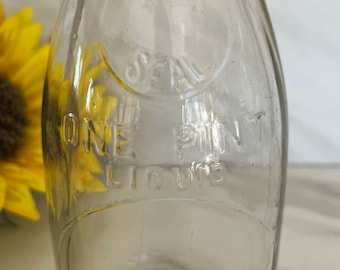 Dairy Bottle Vintage One Pint Milk Bottle marked Wis Seal.