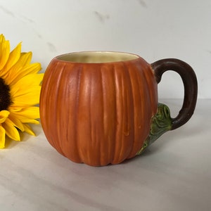 Vintage Handmade Ceramic Bisque Pumpkin Mugs with vine Handle. Soft Glaze Finish. Signed on Bottom 1977.