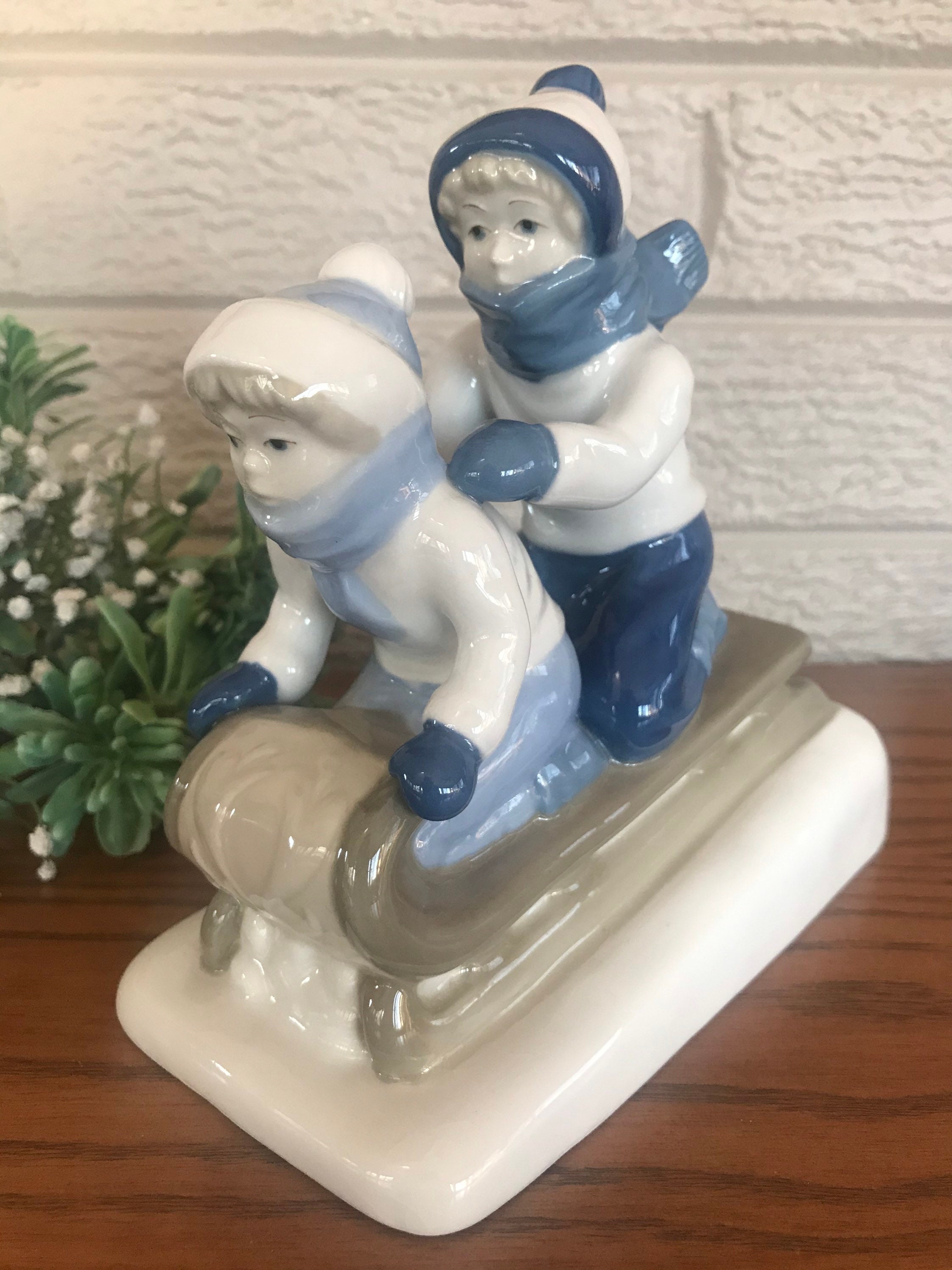 Vintage Porcelain Paul Sebastian Sledding Children Figurine. - Etsy