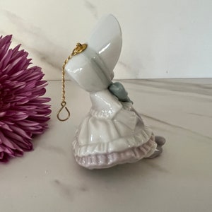 Lladro 1995 Vintage Porcelain Victorian Christmas Ornament Victorian Girl with Bonnet. Made in Spain. Marked Lladro on Bottom. image 6