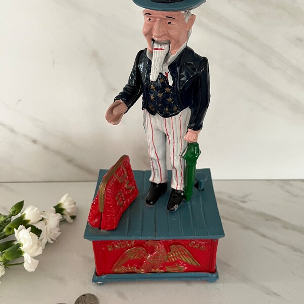 Bank Cast Iron Mechanical Toy Bank. Uncle Sam US. Made in Taiwan marked in Bottom. 1976