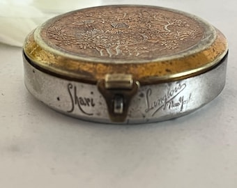 Vintage Shari Langlois New York rouge Compact. Silver-toned metal engraved Sahri Langlois New York. 1920’s. Read listing for wear.