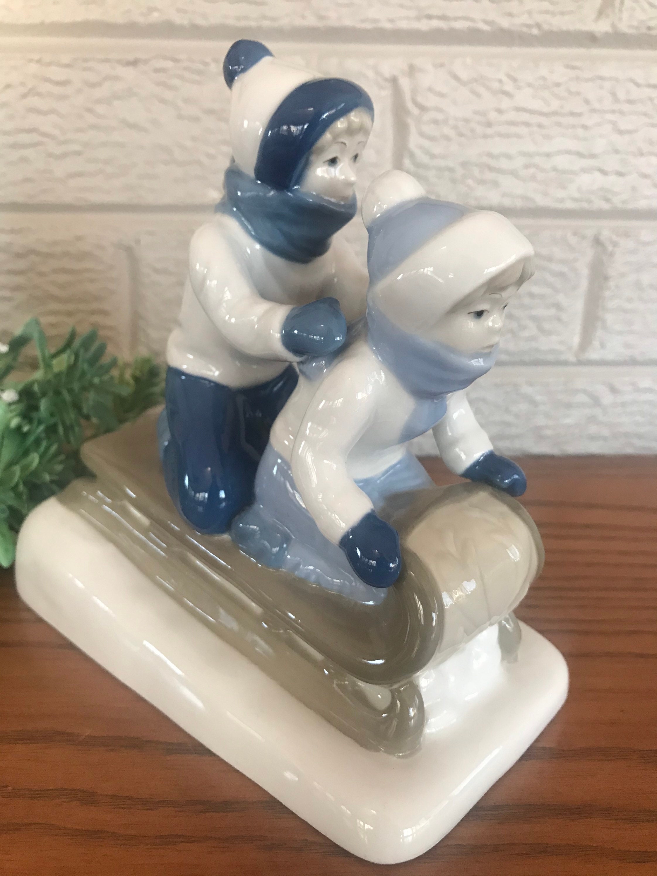 Vintage Porcelain Paul Sebastian Sledding Children Figurine. - Etsy