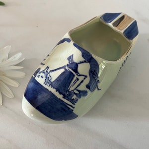 Ashtray Delft Ceramic Wooden Shoe Souvenir Ashtray. Marked Holland With Classic Windmill. Marked Delft on Bottom. 1970’s