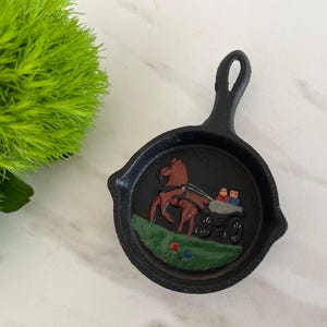 Cast Iron Vintage Miniature Skillet Ashtray with Amish Style Horse and Buggy.