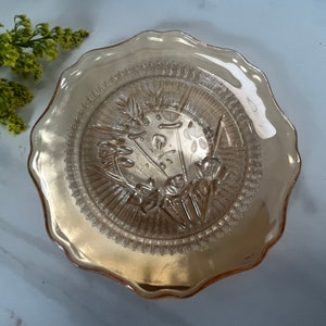 Marigold Carnival Glass Iridescent Bon bon Dish. Round shaped. Iris Pattern. Made by Jeanette Glass. 1960’s