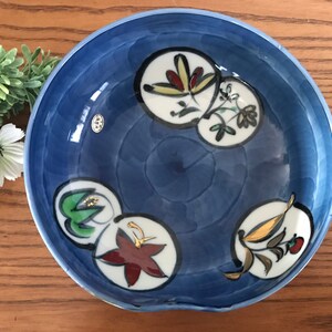 Japanese Porcelain Serving Bowl. Hand Painted 1980’s Signed on bottom and has original sticker.