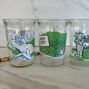 Vintage Welch’s Looney Tunes Collector Series Juice Glasses. Set of Three. Marked Warner Bros. 1994.