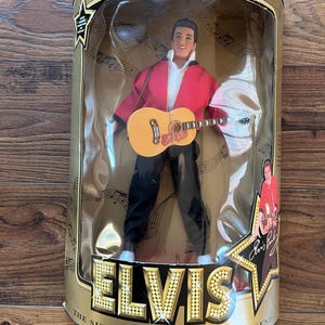 Elvis Presley Jailhouse Rock Elvis Doll. Original Box. Never Opened. Box marked Elvis Presley 1993 Hasbro Special Edition.