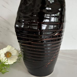 Vintage Drip Glaze Stoneware Pottery Ribbed Vase with shape of Blue Whale. Signed Carlson on bottom.
