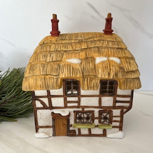 Department 56 Vintage Christmas Village House. Marked on Bottom Dept 56 Snow Dickens Village. Made in Taiwan.