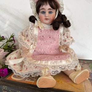 Gebruder Kuhnlenz Doll. Dolly Character Face Bisque Socket Head Doll with Jointed Porcelain Newer Body. Bavaria Germany 1880-1910