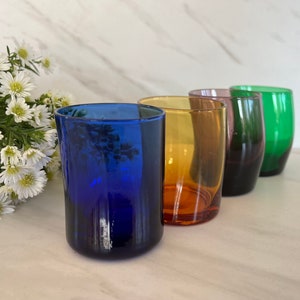 Colorful vintage Whiskey Shot Glass Set. Excellent condition see pics for details. Set of Four.