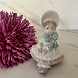 Lladro 1995 Vintage Porcelain Victorian Christmas Ornament Victorian Girl with Bonnet. Made in Spain. Marked Lladro on Bottom. image 1