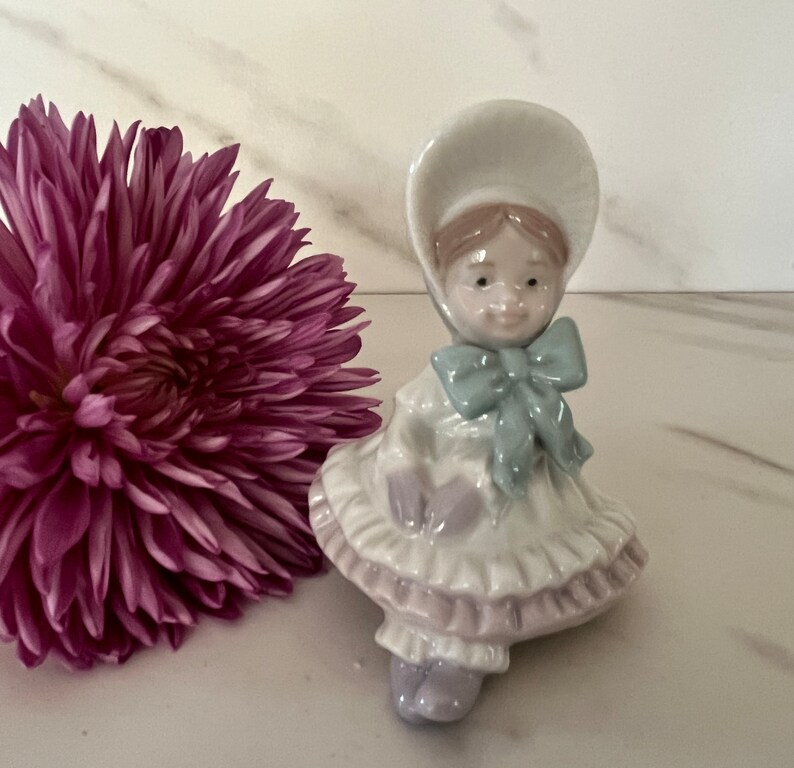 Lladro 1995 Vintage Porcelain Victorian Christmas Ornament Victorian Girl with Bonnet. Made in Spain. Marked Lladro on Bottom. image 1
