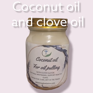 May include: A glass jar with a gold lid filled with a white substance. The label reads "Coconut oil for oil pulling with clove flavor. Natural whitening, support healthy gums. Swish for 5 min, spit in the trash. delonnayholistics.com"