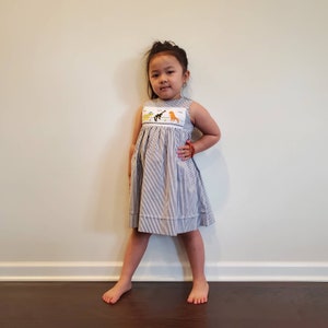Girls (Size 1-6T) Black And White Stripe with Embroidered Dinosaurs Designs