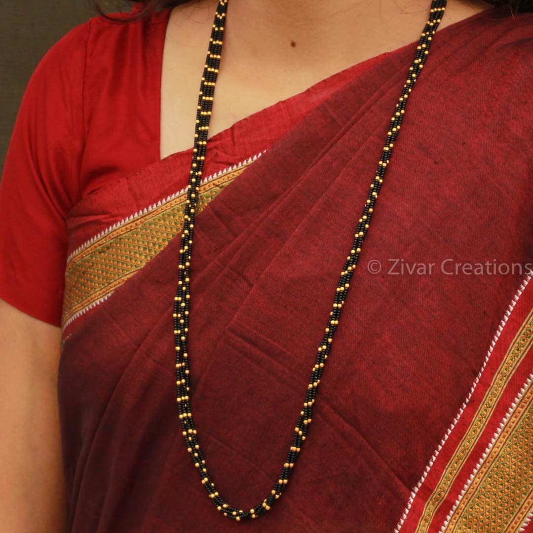 Dholki beads mangalsutra deals