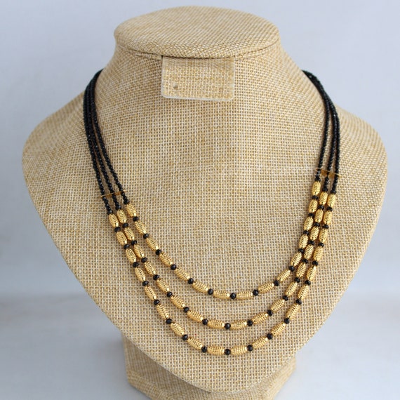 Partial Black Bead Mangalsutra Chain | Sampat Jewellers Inc. | Mangalsutra  chain, Black beads mangalsutra, Black beads mangalsutra design