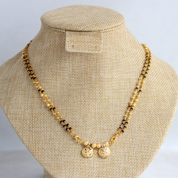 Gold vati hotsell mangalsutra