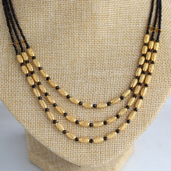 Layered beaded necklace indian online