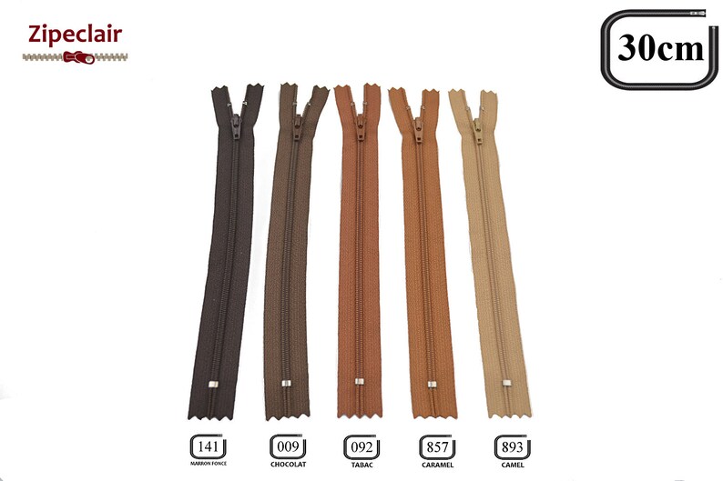 May include: Five different colors of 30-inch zipper tape. The colors are brown, chocolate, tobacco, caramel, and camel. The zipper tape is made of nylon and has a metal slider.