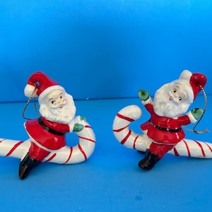 Vintage Holt Howard Japan Set of 2 Santa Riding Candy Canes Ceramic Christmas Ornaments Figurines Lefton Napco Norcrest Ucagco