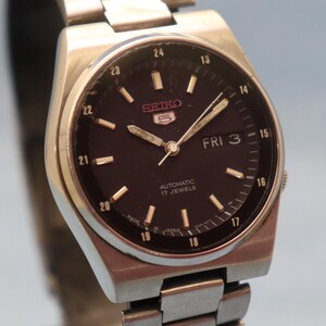 rare vintage Seiko 5 automatic day date railway time movement no. 7009A Japan made men's watch.