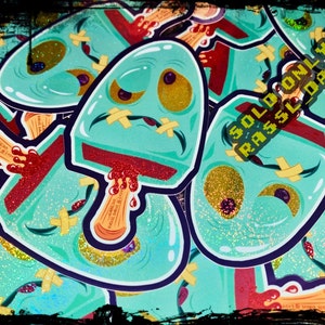 May include: A stack of green and red glitter zombie popsicle stickers with a white bandage and dripping red goo. The stickers have a glittery finish and are sold only by Rasslodazl.