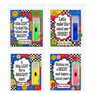 May include: Four clear plastic pouches containing small flashlights with keychains attached to colorful cards. The cards feature checkerboard patterns, smiley faces, flowers, and text including A little LIGHT to start the school year BRIGHT!