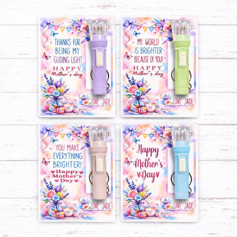 May include: Four Mother's Day cards with colorful designs and small flashlights. Each card has a different message, including "Thanks for being my guiding light" and "Happy Mother's Day." The flashlights are in pastel colors: purple, green, peach, and blue.