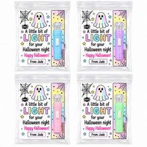 May include: Four clear plastic bags containing small flashlights with keychains. Each bag features a card with a ghost illustration, spider webs, stars, and the text: A little bit of LIGHT for your Halloween night Happy Halloween! From: Jade.