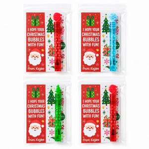 May include: Four bubble wands in clear plastic bags with red cards featuring Christmas graphics, a Santa face, and the text I HOPE YOUR CHRISTMAS BUBBLES WITH FUN! FROM: KAYLEE. The wands are red, blue, green, and red with festive toppers.