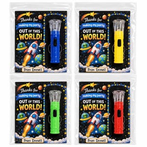 May include: Four clear plastic bags each containing a small flashlight keychain attached to a card. The cards feature space-themed graphics, a rocket, planets, and the text: Thanks for making my party OUT OF THIS WORLD! From: Emmett.