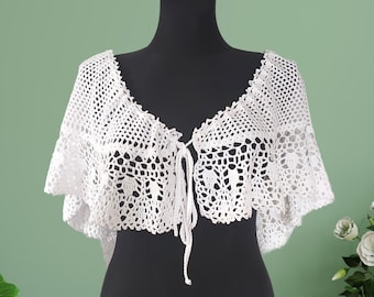Damesrok van gehaakt kant, bolero, capelet