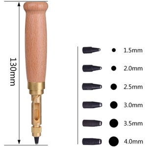May include: A leathercraft tool set with a wooden handle, brass parts, and interchangeable punch heads. The tool is 130mm (13 cm) long. Includes punch heads for 1.5mm, 2.0mm, 2.5mm, 3.0mm, 3.5mm, and 4.0mm holes.