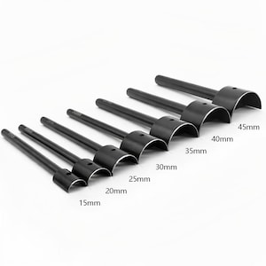 May include: A set of seven black leathercraft round hole punches. Sizes range from 15mm to 45mm. Each punch has a cylindrical handle and a curved cutting edge, ideal for creating clean, circular holes in leather and similar materials.