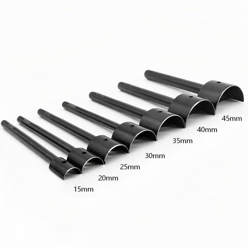 May include: A set of seven black leathercraft round hole punches. Sizes range from 15mm to 45mm. Each punch has a cylindrical handle and a curved cutting edge, ideal for creating clean, circular holes in leather and similar materials.