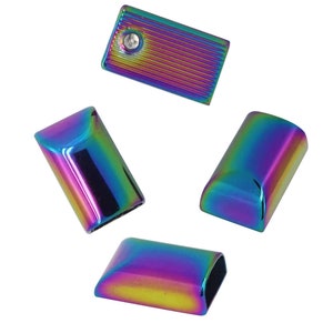 May include: Four iridescent metal end caps for a cord or strap. The end caps are rectangular with rounded edges and have a rainbow finish.
