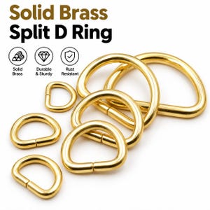 May include: A collection of gold-colored solid brass split D rings in various sizes. The image includes text that reads Solid Brass Split D Ring, Solid Brass, Durable & Sturdy, and Rust Resistant. The rings have a smooth, metallic finish.