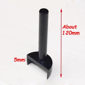 May include: A black tool with a cylindrical handle and a semi-circular base. The handle is approximately 120mm long. The base is about 5mm wide. The text "About 120mm" and "5mm" are visible.
