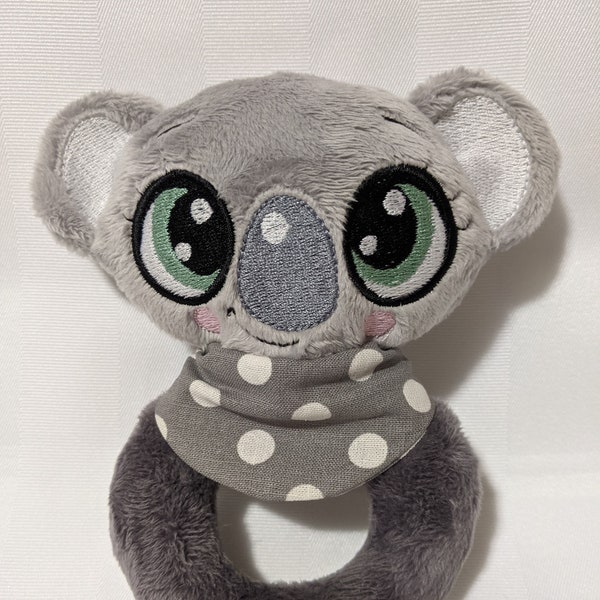 Archivo de bordado, sonajero KOALA, marco de 10x10cm con algunas pequeñas costuras a mano