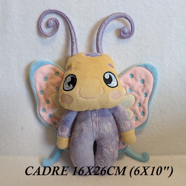 BUTTERFLY doll, frame 16x26cm (6x10''), finished size: 35cm (14") high x 33cm (13") wide, ITH, with some small hand sewing