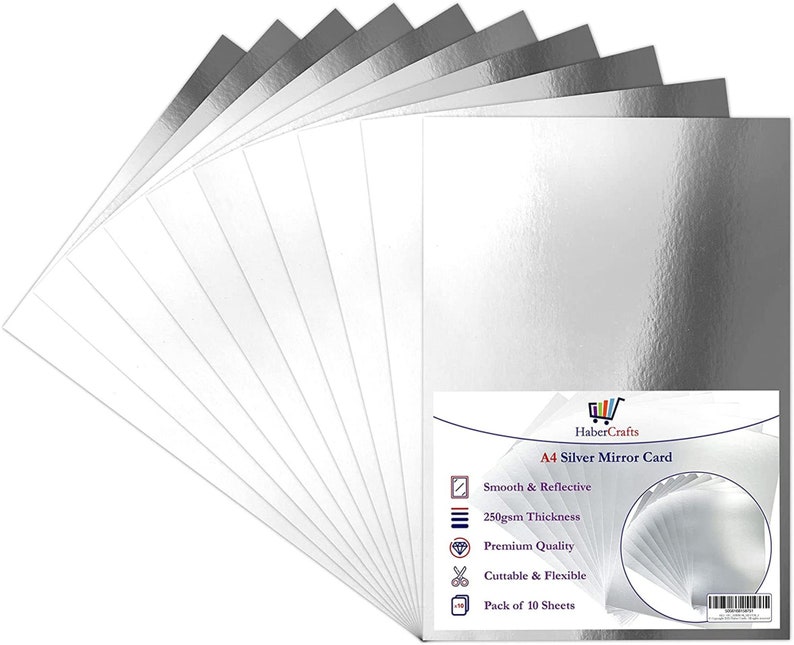 K&ouml;nnte beinhalten: Eine Packung mit 10 silbernen Spiegelkarten in A4-Gr&ouml;&szlig;e. Die Karte ist glatt und reflektierend, 250 g/m&sup2; dick, von Premiumqualit&auml;t, schneidbar und flexibel. HaberCrafts A4 Silver Mirror Card.