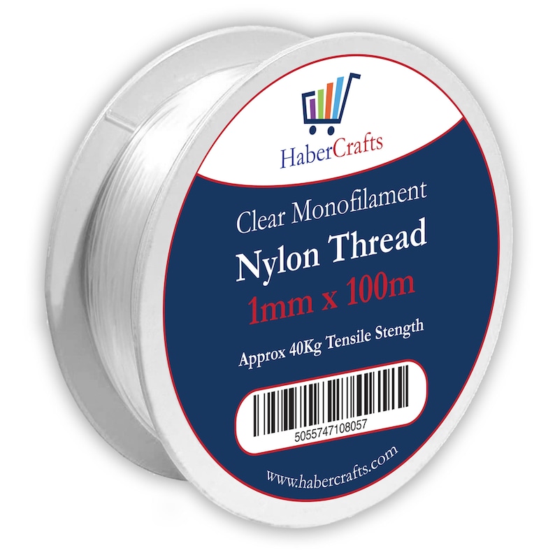 May include: A spool of clear monofilament nylon thread, 1mm thick and 100 meters long. The spool is labeled "Clear Monofilament Nylon Thread 1mm x 100m" and "Approx 40Kg Tensile Strength". The label also includes the website address "www.habercrafts.com" and a barcode.