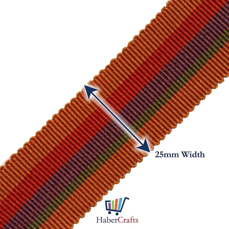May include: A close-up of a 25mm wide striped ribbon with orange, red, purple, and green stripes. The ribbon is a woven fabric with a textured surface.